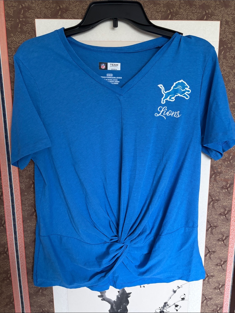 NFL Detroit Lions Women's Royal Blue V-Neck Twist Front Tee